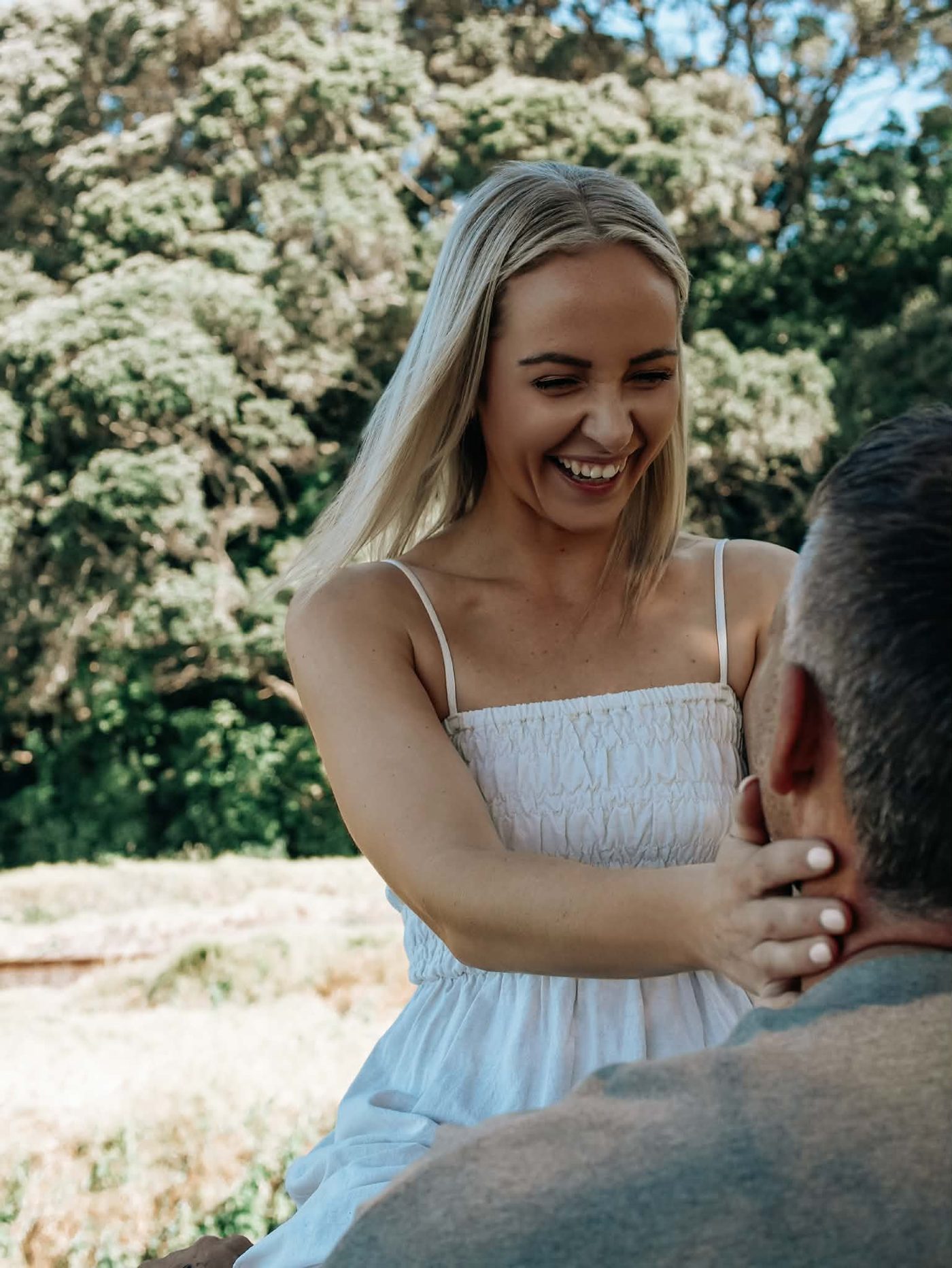 Lacy and Josh laughing together in a candid moment